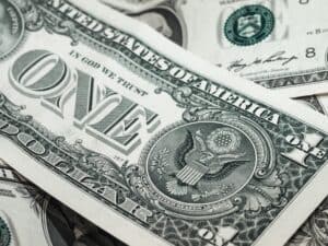 Image of one dollar bills source on pexels